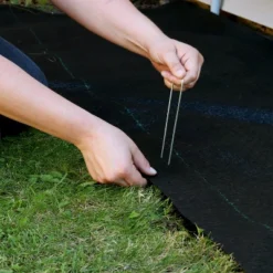 Sunnydaze Decor Sunnydaze UV Resistant Landscape Fabric Weed Barrier Fabric With Landscape Staples -Home Improvement Store GUEST 7c270fef 1dd3 4f4b 9419 7027a0616c00