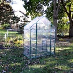 Sunnydaze Decor Sunnydaze Outdoor Portable Tiered Growing Rack Deluxe Walk-In Greenhouse With Roll-Up Door - 4 Shelves - Clear - 54" X 28" X 77" -Home Improvement Store GUEST 814f7270 00c1 4a5e ad3c b1005f24139f
