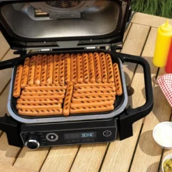 Ninja Woodfire Outdoor Grill & Smoker, 7-in-1 Master Grill, BBQ Smoker And Air Fryer With Woodfire Technology - OG701 22 Ninja Woodfire Outdoor Grill & Smoker, 7-in-1 Master Grill, BBQ Smoker And Air Fryer With Woodfire Technology - OG701 -Home Improvement Store GUEST d47d7071 140e 47b4 b31b 5a0e71053c12